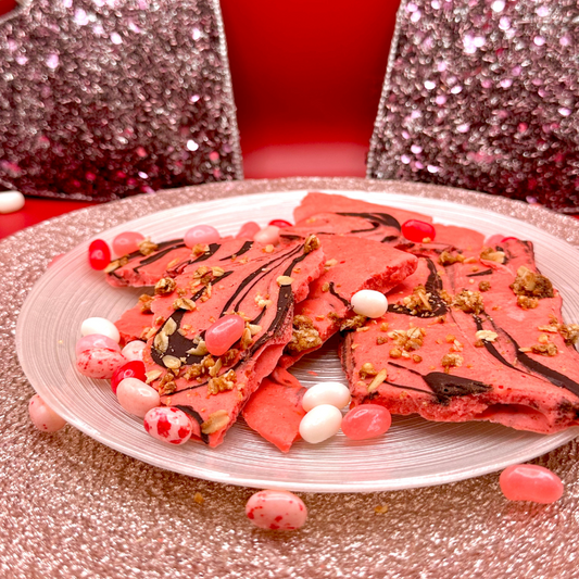 A full plate of colorful Frozen Cottage Cheese Bark on a white plate.