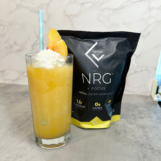 A tall glass of 4 Ingredient Frozen Peach Lemonade with CorVive NRG supplement